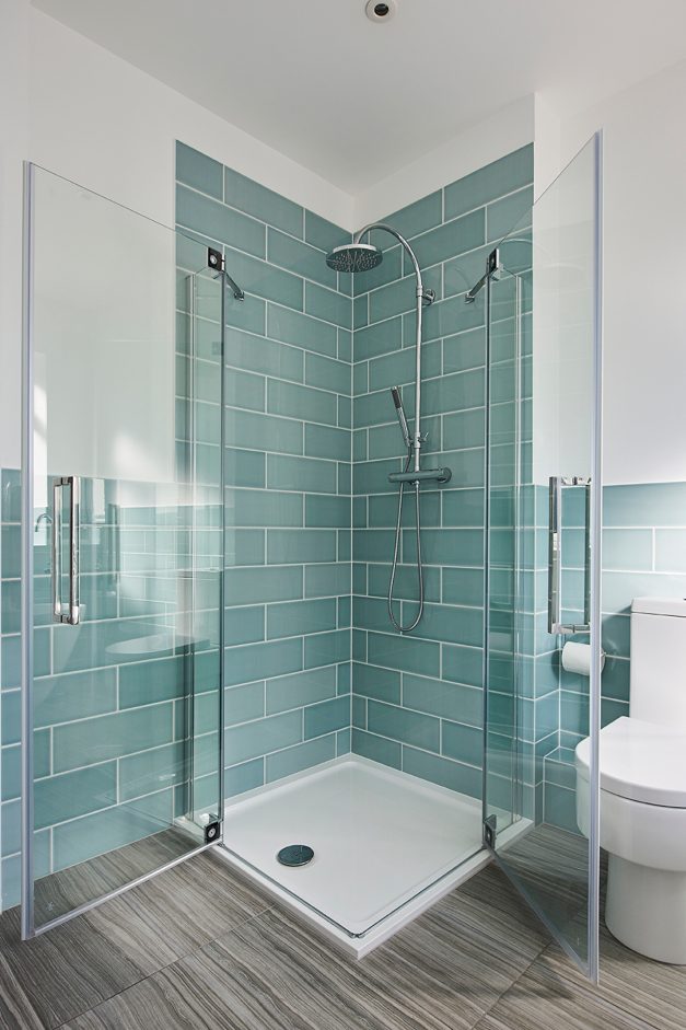 Azure blue tiles in bathroom